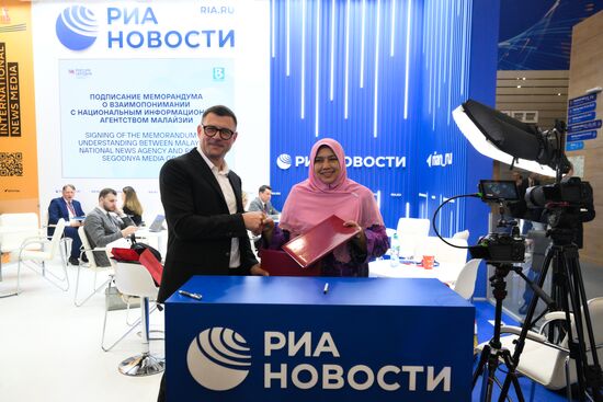 SPIEF-2025. RIA Novosti stand and Sputnik Radio studio