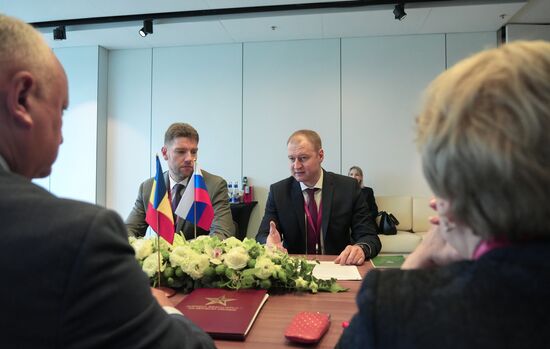 SPIEF-2025. Meeting of Moldovan Party of Socialists leader I. Dodon and Russian Agriculture Deputy Ministers A. Razin and M. Markovich