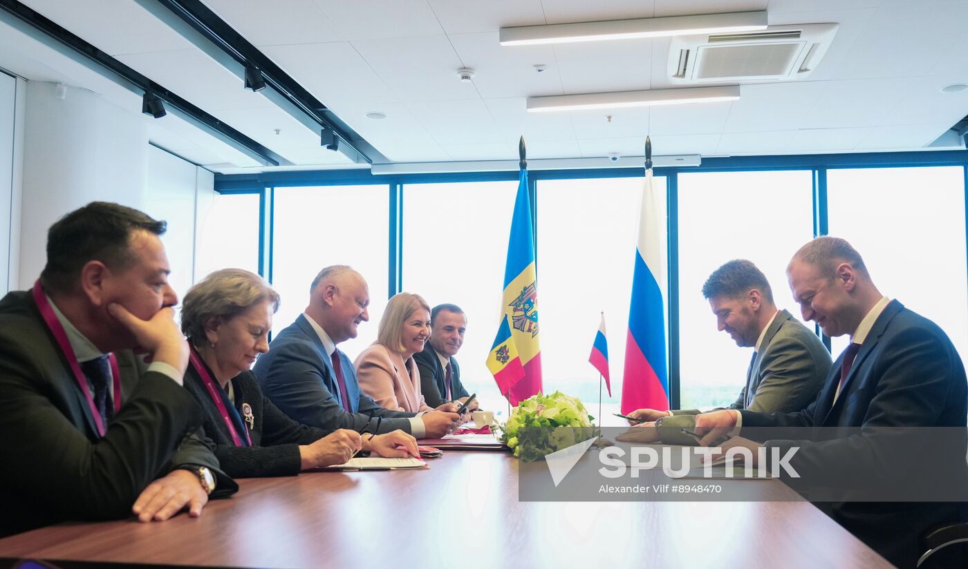 SPIEF-2025. Meeting of Moldovan Party of Socialists leader I. Dodon and Russian Agriculture Deputy Ministers A. Razin and M. Markovich