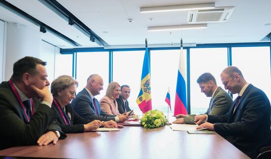 SPIEF-2025. Meeting of Moldovan Party of Socialists leader I. Dodon and Russian Agriculture Deputy Ministers A. Razin and M. Markovich