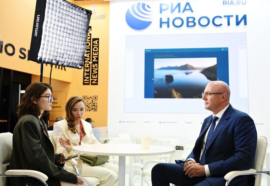 SPIEF-2025. RIA Novosti stand and Sputnik Radio studio