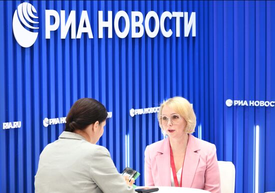 SPIEF-2025. RIA Novosti stand and Sputnik Radio studio