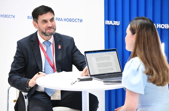 SPIEF-2025. RIA Novosti stand and Sputnik Radio studio