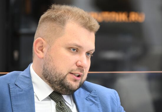 SPIEF-2025. RIA Novosti stand and Sputnik Radio studio