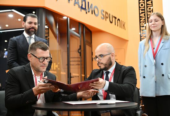 SPIEF-2025. RIA Novosti stand and Sputnik Radio studio