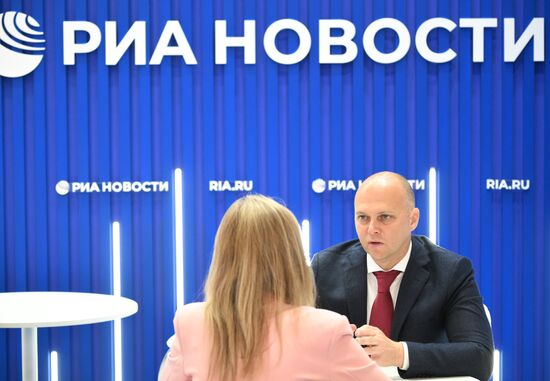 SPIEF-2025. RIA Novosti stand and Sputnik Radio studio