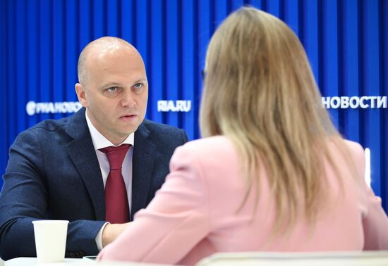 SPIEF-2025. RIA Novosti stand and Sputnik Radio studio