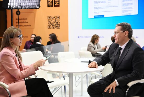 SPIEF-2025. RIA Novosti stand and Sputnik Radio studio