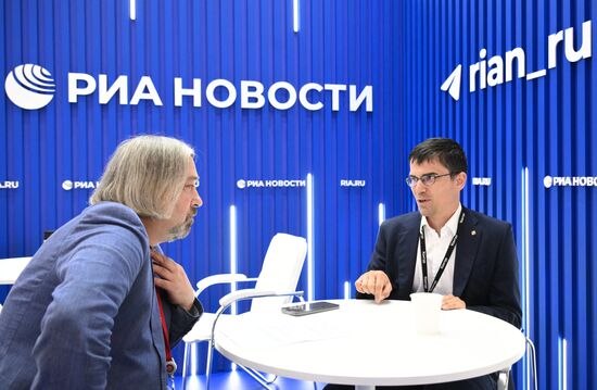 SPIEF-2025. RIA Novosti stand and Sputnik Radio studio
