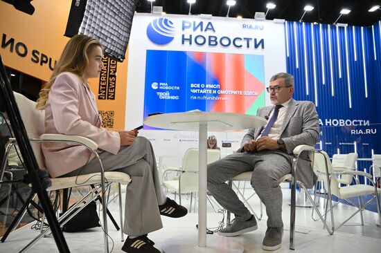 SPIEF-2025. RIA Novosti stand and Sputnik Radio studio