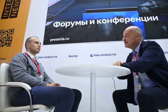 SPIEF-2025. RIA Novosti stand and Sputnik Radio studio