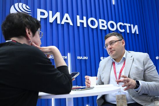 SPIEF-2025. RIA Novosti stand and Sputnik Radio studio