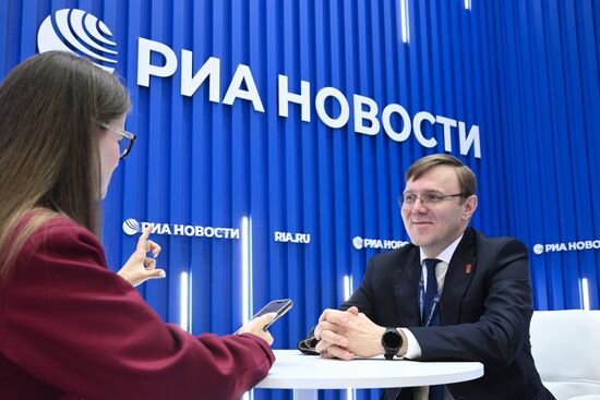 SPIEF-2025. RIA Novosti stand and Sputnik Radio studio