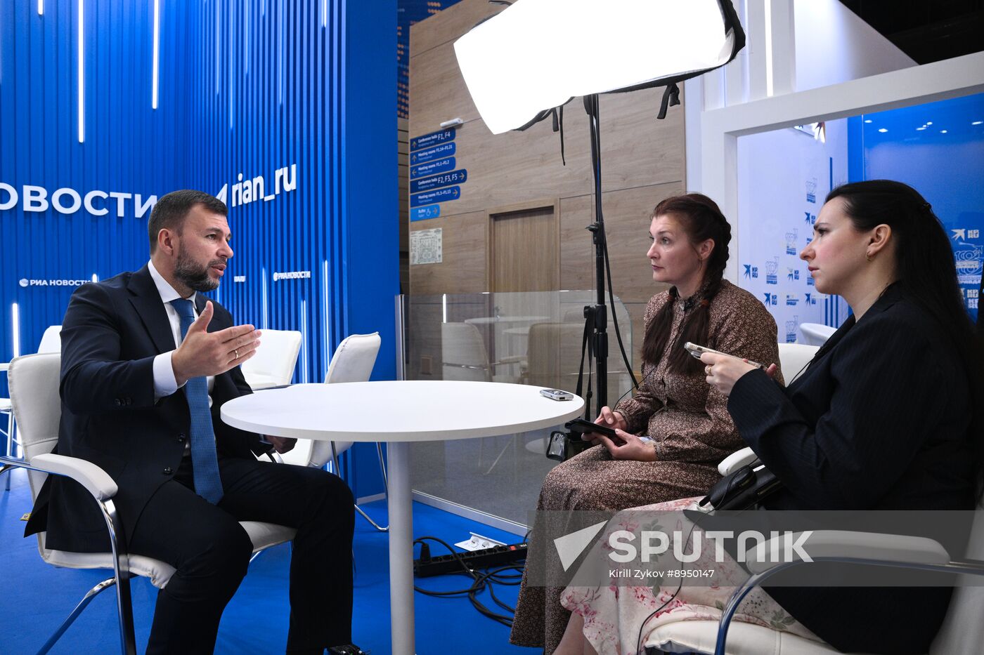 SPIEF-2025. RIA Novosti stand and Sputnik Radio studio