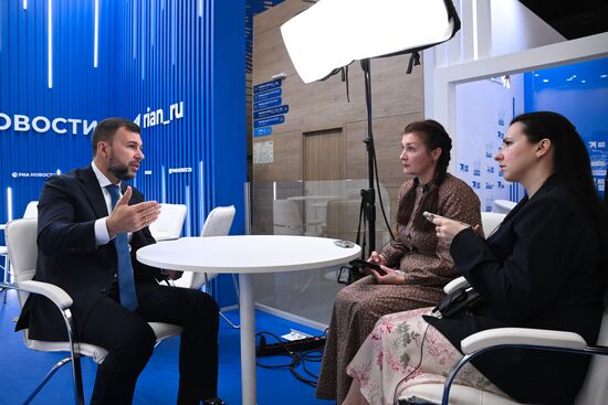 SPIEF-2025. RIA Novosti stand and Sputnik Radio studio