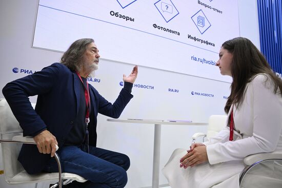 SPIEF-2025. RIA Novosti stand and Sputnik Radio studio