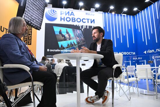 SPIEF-2025. RIA Novosti stand and Sputnik Radio studio