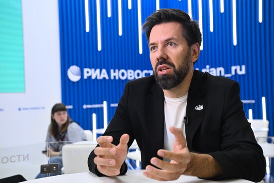 SPIEF-2025. RIA Novosti stand and Sputnik Radio studio