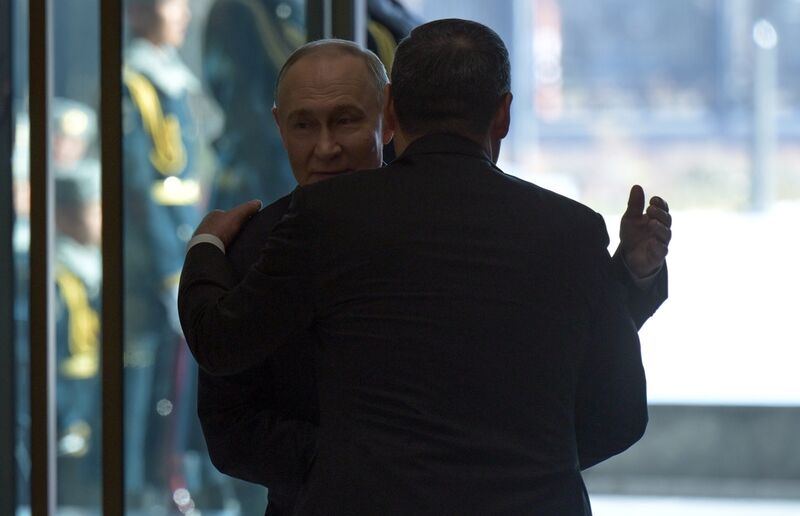 Russian President Vladimir Putin is welcomed by Kyrgyz President Sadyr Japarov before a meeting of the Collective Security Treaty Organization (CSTO) summit in a narrow format at the Yntymak Ordo Presidential Administration in Bishkek, Kyrgyzstan. Kyrgyzstan CSTO Summit