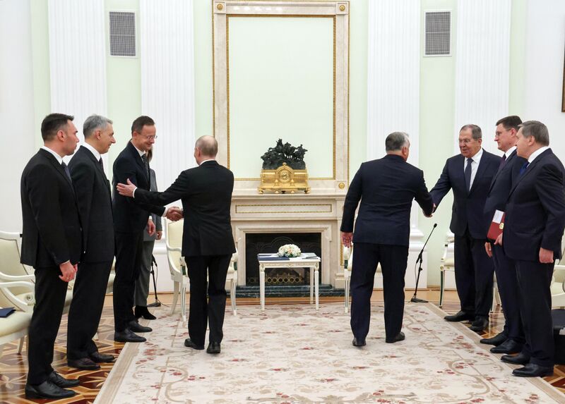 Russian President Vladimir Putin greets Hungarian Minister of Foreign Affairs and Trade Peter Szijjarto as Hungarian Prime Minister Viktor Orban greets Russian Foreign Minister Sergey Lavrov before a meeting at the Kremlin in Moscow, Russia. Russia Hungary