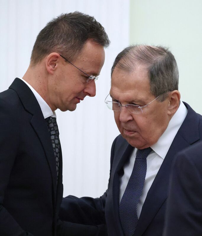 Hungarian Minister of Foreign Affairs and Trade Peter Szijjarto talks to Russian Foreign Minister Sergey Lavrov before a meeting between Russian President Vladimir Putin and Hungarian Prime Minister Viktor Orban at the Kremlin in Moscow, Russia. Russia Hungary