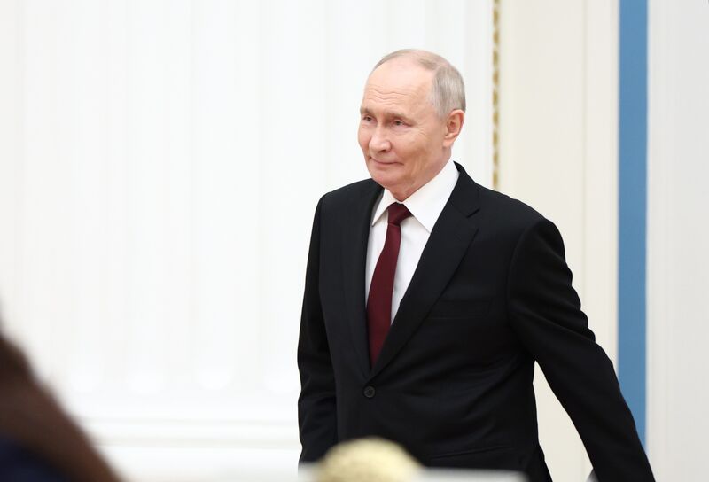 Russian President Vladimir Putin arrives to attend a meeting with participants of the 5th Congress of Young Scientists at the Kremlin in Moscow, Russia. President Vladimir Putin meets with Young Scientists Congress participants