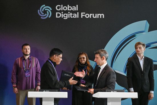 The 2nd Global Digital Forum. The ceremony to sign a Memorandum on Accession to the State Digital Sovereignty Index of the ANO Center for Global IT-Cooperation (Russia) and on Cooperation for Its Development with Regenerative Futures S/B (Malaysia). From left, foreground: Rama Prasad Varanasi, Chief Executive Officer, Regenerative Futures (Malaysia), Vadim Glushchenko, Director, ANO Center for Global IT Cooperation (Russia). Location: Russia, Moscow. Author: Maksim Blinov/Sputnik. Global Digital Forum 2026. Signing ceremonies