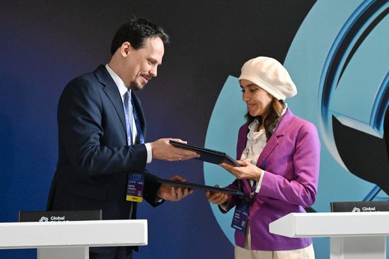 The 2nd Global Digital Forum. Signing ceremonies. From left: Dmitry Fofanov, Editor-in-Chief, IT-Russia; Ikram Zaoudi, Director, Communication Box; Expert, Global Fact-Checking Network (GFCN) (Algeria). Location: Russia, Moscow. Author: Maksim Blinov/Sputnik. Global Digital Forum 2026. Signing ceremonies