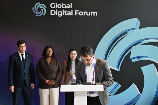 The 2nd Global Digital Forum. Signing of a Memorandum of Intent regarding collaborative network research by BRICS scholars to advance strategic cooperation on the digital transformation of the economy. From left: Igor Savelyev, Director, BRICS Center for Communications and Business Partnerships at the Faculty of Economics, Lomonosov Moscow State University; Paballo Patience Ntobaki, Researcher at the BRICS Research Institute, University of Venda; Deng Junzhi, Researcher at the Shanghai University of International Business and Economics; Karim Mohamed Abul-Dahab, Research Fellow at the Arab Academy for Science, Technology and Maritime Transport Location: Russia, Moscow. Author: Maksim Blinov/Sputnik. Global Digital Forum 2026. Signing ceremonies