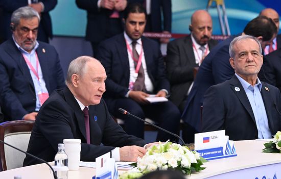 From left: President of Russia Vladimir Putin and President of Iran Masoud Pezeshkian take part in the plenary session of the 8th Summit of the Gas Exporting Countries Forum in Moscow. Location: Russia, Moscow. Author: Maksim Bogodvid/Sputnik. GECF Summit. Plenary session