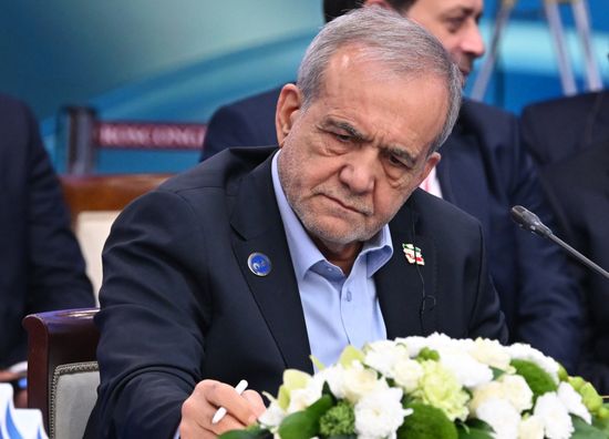 President of Iran Masoud Pezeshkian at the plenary session of the 8th Summit of the Gas Exporting Countries Forum in Moscow. Location: Russia, Moscow. Author: Maksim Bogodvid/Sputnik. GECF Summit. Plenary session
