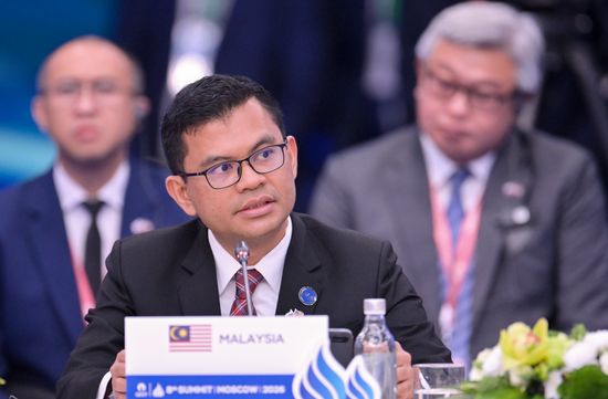 Minister of Economy of Malaysia Akmal Nasrullah Mohd Nasir takes part in the plenary session of the 8th Summit of the Gas Exporting Countries Forum in Moscow. Location: Russia, Moscow. Author: Yuri Kochetkov/Sputnik. GECF Summit. Plenary session