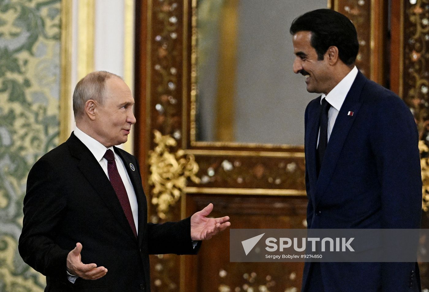 President Vladimir Putin meets with Emir of Qatar Tamim bin Hamad Al Thani