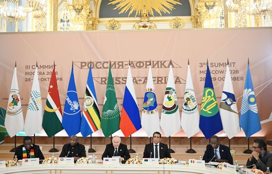 Russian President Vladimir Putin during a meeting with the heads of African regional organizations, held on the sidelines of the 3rd Russia–Africa Summit and Forum. From left: President of Zimbabwe Emmerson Dambudzo Mnangagwa; President of Burundi, Chairperson of the African Union Évariste Ndayishimiye; Chairman of the Presidential Council of Libya Mohamed al-Menfi; and Minister of African Integration, Foreign Affairs, and Senegalese Abroad of Senegal Cheikh Niang. Location: Russia, Moscow. Author: Maksim Bogodvid/Sputnik. Russian President Vladimir Putin meets with heads of African regional organizations