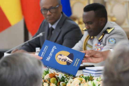Prime Minister of Ethiopia Abiy Ahmed presents a copy of the Russian edition of his book "Medemer" to President of Russia Vladimir Putin during their meeting on the sidelines of the 3rd Russia–Africa Summit and Forum in Moscow. Location: Russia, Moscow. Author: Grigory Sysoev/Sputnik. President of Russia Vladimir Putin meets with Prime Minister of Ethiopia Abiy Ahmed